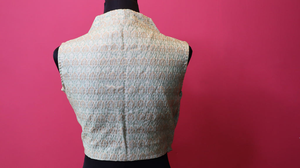 Elegant Designer Sleeveless Blouse – Soft Pastel Traditional Pattern